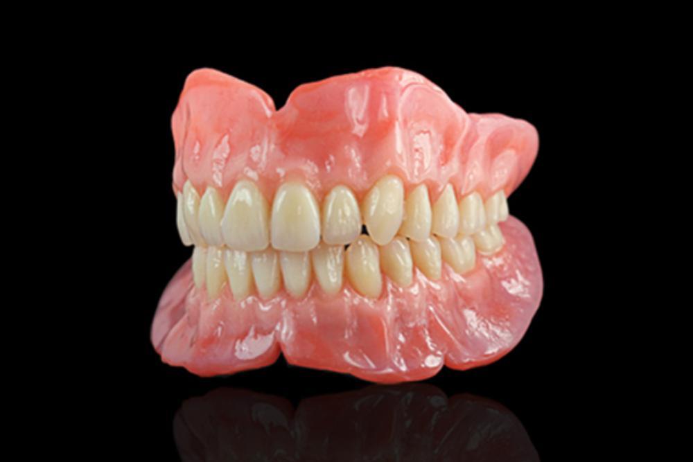 complete denture acrylic teeth on model